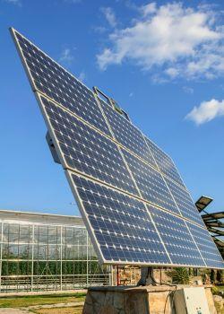 Solar Panel Beside Greenhouse